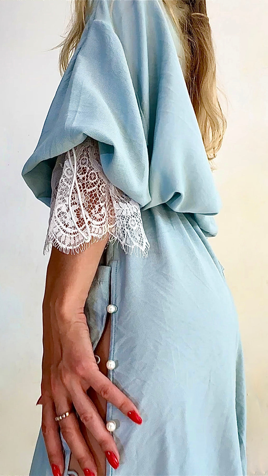 Soft lace detail with flowing sky blue resort fabric