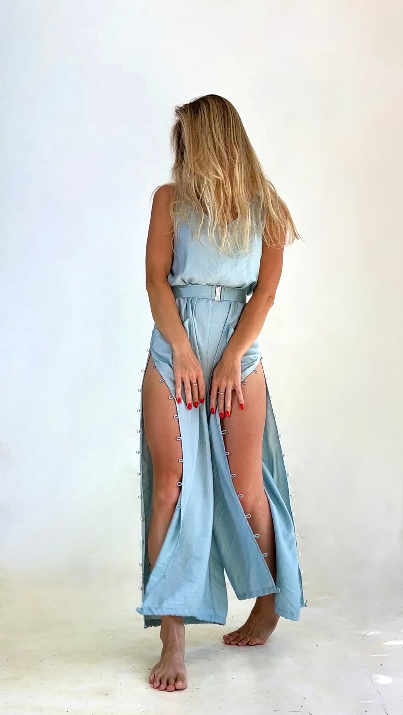 Wide leg sky blue jumpsuit with feminine relaxed silhouette