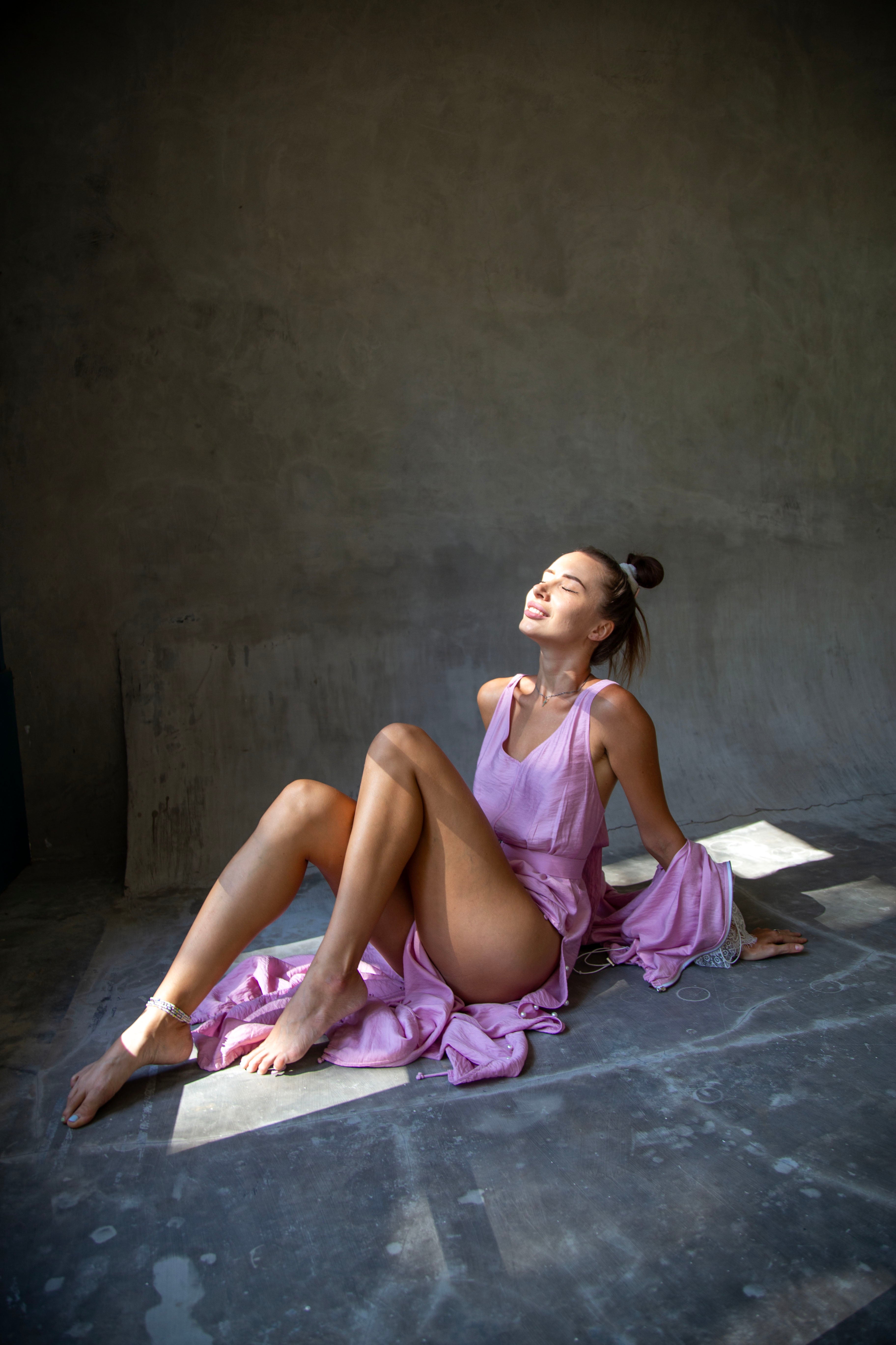 Luxury pink evening jumpsuit with fluid draped silhouette