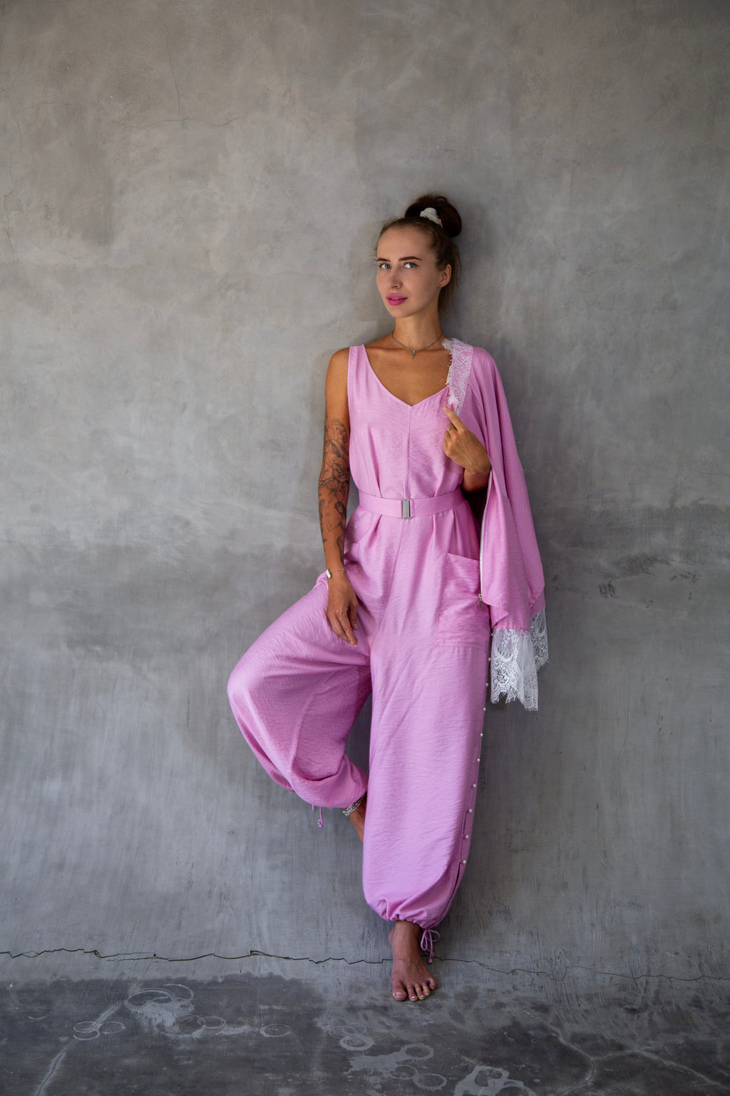 Luxury pink wide leg jumpsuit with relaxed feminine silhouette